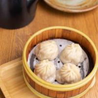 Shanghai Steam Pork Dumplings 小笼包 · Cooked using moist heat. Stuffed dough. 