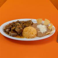 Costillitas en Salsa de Molcajete · Pork ribs dipped in our delicious molcajete salsa, served with rice, pinto beans and corn to...