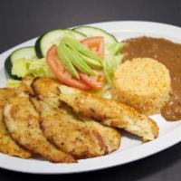 Pechuga de Pollo a la Plancha · Boneless, skinless, grilled chicken breast. Served with rice, pinto beans, salad and corn to...