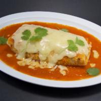 Asada wet burrito rojo · Beef Burrito stuffed with rice and beans; covered with our special spicy red sauce and melte...