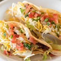 Beef Hard Taco · Cheese, lettuce and Mexican salsa.