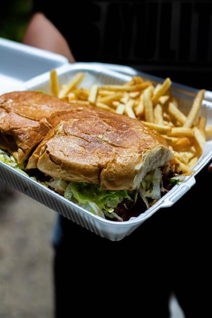 Milanesa Torta · Mexican sandwich served with guacamole, lettuce and salsa fresca and fries on the side.