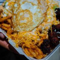 Medium Longanisa Fries · Curly fries, guacamole, sour cream, cheese, chipotle sauce, and 2 fried eggs, and sweet pork...