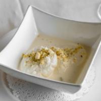 Rasmalai · 2 pieces. Homemade cheese in special condensed milk flavored with rose water and garnished w...
