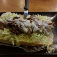 Boise Cheese steak · 5oz filet mignon, provolone, grilled onions, mayo and lettuce on a French roll