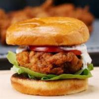 Buffalo Chicken Sandwich · Buffalo chicken sandwich flame-grilled or crispy fried chicken topped with your choice of wi...