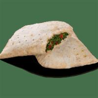 Spinach Patty · Seasoned steamed spinach wrapped in a spinach-speckled whole wheat flaky crust.
