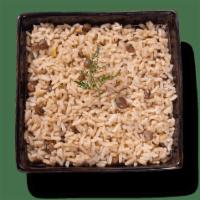 Rice & Peas · Aromatic traditional Jamaican side dish. Seasoned with thyme, garlic, and a blend of spices,