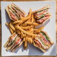 Club House Sandwich · With Ham, American cheese, Tomato, lettuce, Eggs, chicken and pink sauce.