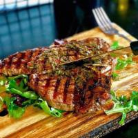 101. Grilled T-BONE  Steak · Delicious beef, never frozen served with two side.