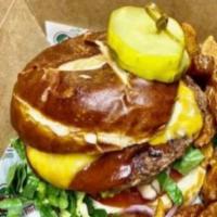 The Hickory Stick Burger · Choice of protein, Leidy's thick-cut bacon, Memphis BBQ sauce, cheddar cheese, lettuce, toma...