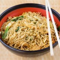 Traditional Singapore Noodle · Angel hair rice noodle cooked with egg and basic vegetables with yellow curry powder. Spicy.