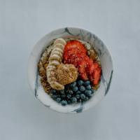 Granola Bowl · Granola, honey yogurt, peanut butter, bananas, blueberries, strawberries, and shaved chocola...