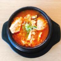 Spicy Soft Tofu Stew (Soondubu) · Slow cooked soup.