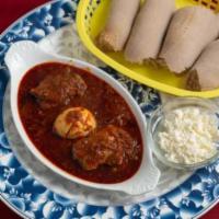 1. Doro Wot Dish · 2 tender chicken legs marinated in lemon juice and ginger, cooked in a homemade spicy stew, ...