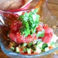 Japanese Tuna Ceviche · A hidden gem on the menu, crunchy cucumbers, onions, and cilantro in a spicy citrus sauce. S...