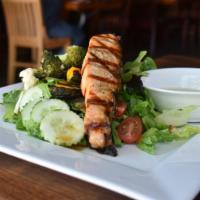 Grilled Salmon Salad · Salmon fillet grilled golden with crispy skin-on, miso dressing.