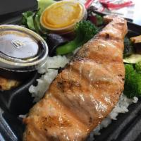 Teriyaki Salmon Bento · Grilled golden with crispy skin-on, we buy the fish whole and fillet it ourselves, this way,...