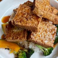 Teriyaki Tofu Bowl · Crispy fried tofu served with extra veggies. Includes rice and vegetables.