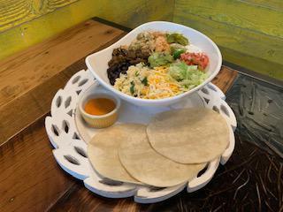 Fajita Bowl (Chicken + Steak + Shrimp) · Chicken + steak + shrimp + rice +beans +any hot toppings + any cold toppings. Served with 3 flour tortillas side.