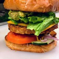 Veggie Burger · Garden Burger patty on toasted Brioche bun topped with lettuce, tomato, onion, pickle, mayon...