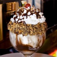 Big Tom Sundae · Scoops of vanilla ice cream with chocolate syrup, whipped cream, hot syrup, caramelized waln...