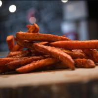 Sweet Potato Fries · Deep fried to perfection.