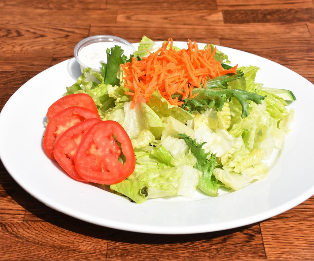 Green Salad · Romaine lettuce, spring green mix, tomato, Persian cucumber and carrots with special house dressing. Vegetarian and gluten free.