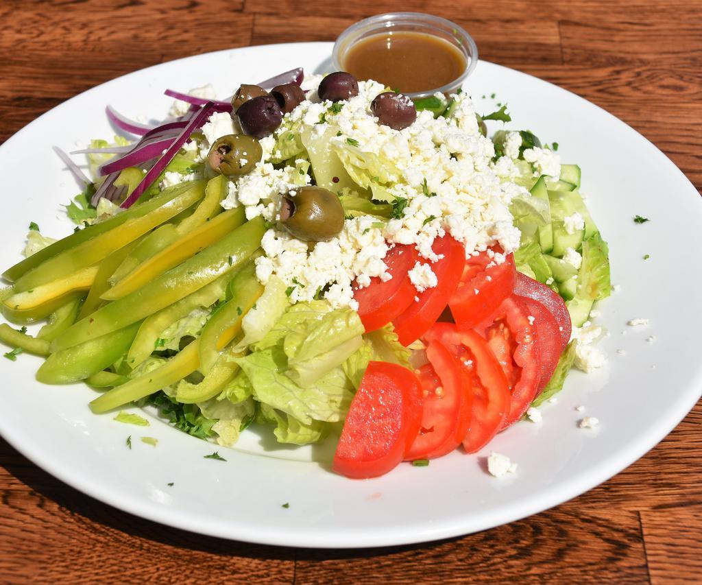 Greek Salad · Romaine lettuce, spring green mix, feta cheese, tomato, Persian cucumber, onion, bell peppers and olive with a balsamic dressing. Vegetarian and gluten free.