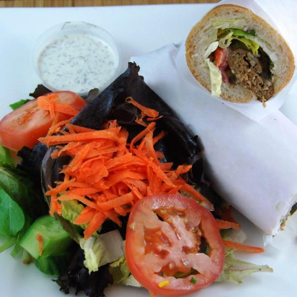 Koobideh Sandwich · Season ground sirloin or chicken with lettuce, tomato, pickle and house dressing. Served in a French baguette with a choice of green salad or french fries.