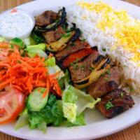 Shish Kabob · Grilled pieces of all natural filet mignon marinated with bell pepper and onion.