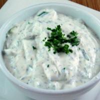 Mast O Khiar · Vegetarian. Yogurt mixed with chopped Persian cucumber and mint. Served with pita bread.