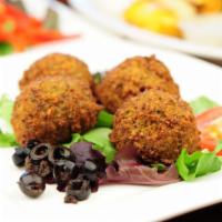 Falafel · Vegetarian. 4 fried vegetarian patties made from fava beans, garbanzo beans and spices. Serv...