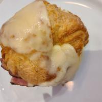 Ham and Cheese Croissant · Tavern ham, Swiss, and béchamel on a croissant.