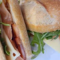 Smoked Salmon Sandwich · Swiss, lettuce, tomato, chopped egg, red onion, homemade mayonnaise, and smoked salmon on a ...
