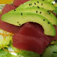 Tuna Salad · Fresh tuna, lettuce, cucumber, carrot and avocado with ginger dressing.