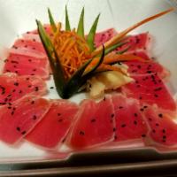 Tuna Tataki · Quick served tuna with ponzu sauce.