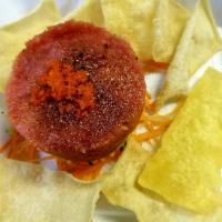 Tuna Tower · Chopped tuna mixed with kimchee sauce and masago served with wonton chips.