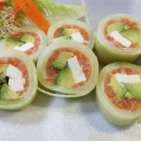 KC · Salmon, avocado, cream cheese wrapped with thin cucumber in ponzu sauce.
