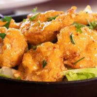 Boom Boom Shrimp ⭐️ · Hand-breaded shrimp to crispy, golden perfection, then tossed with sriracha in a creamy swee...