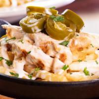 Chicken Alfredo Fries · It's our signature dish, except on French fries! We start with golden fries, then layer on t...