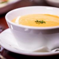 Lobster Bisque · This light, creamy lobster bisque features fresh cream and real lobster finished with a touc...