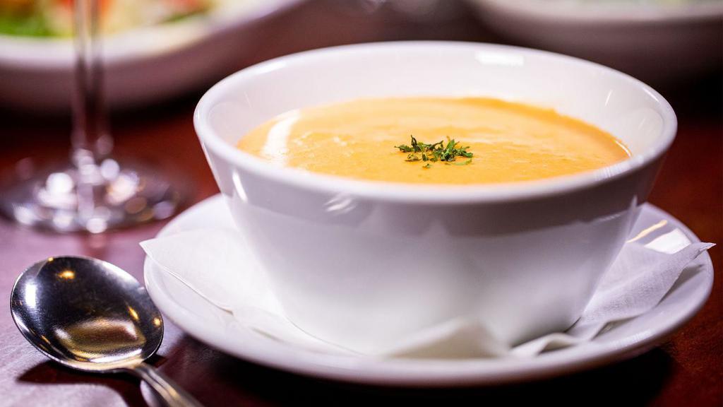 Lobster Bisque · This light, creamy lobster bisque features fresh cream and real lobster finished with a touch of sherry.