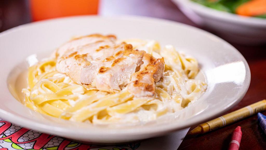Kids Chicken Alfredo ⭐️ · A kids portion of fettuccine tossed with slices of grilled chicken in our creamy Alfredo.