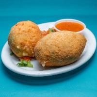 Stuffed Avocado · Breaded and deep-fried whole avocado stuffed with cheese and your choice of beef, chicken, a...