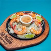 Fajitas del Mar Platter · 6 grilled jumbo shrimp sauteed in garlic butter sauce, served with Mexican rice, charro bean...