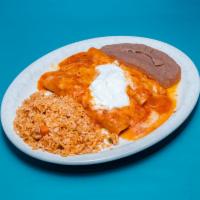 Pollo Enchiladas · 3 chicken-in-salsa enchiladas topped with ranchero sauce, melted Monterey Jack cheese and so...