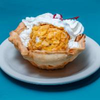 Fried Ice Cream · Served in a flour tortilla shell, served with whipped cream.