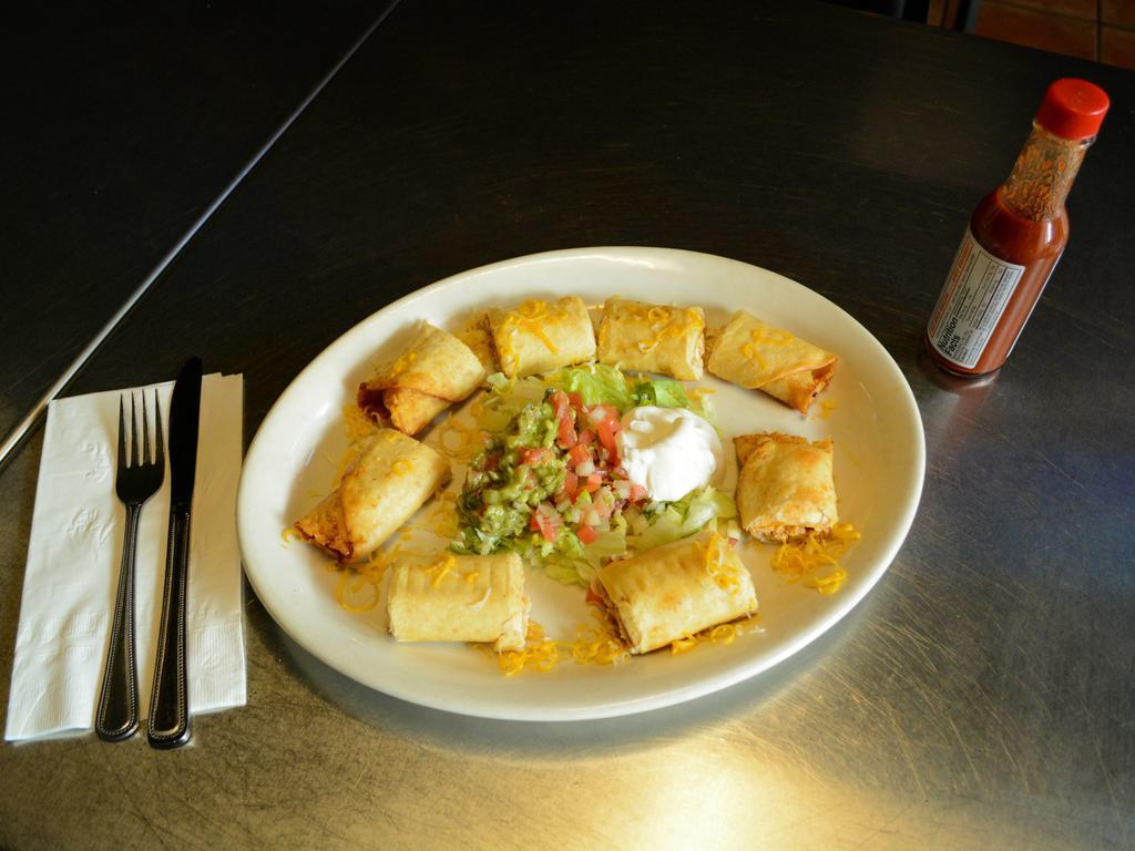 Chicken Taquitos · 8 pieces. Stuffed flour tortillas with shredded chicken and cheese deep fried and served with guacamole and sour cream.
