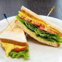 Egg Sandwich · Eggs, lettuce, tomato, mayo.